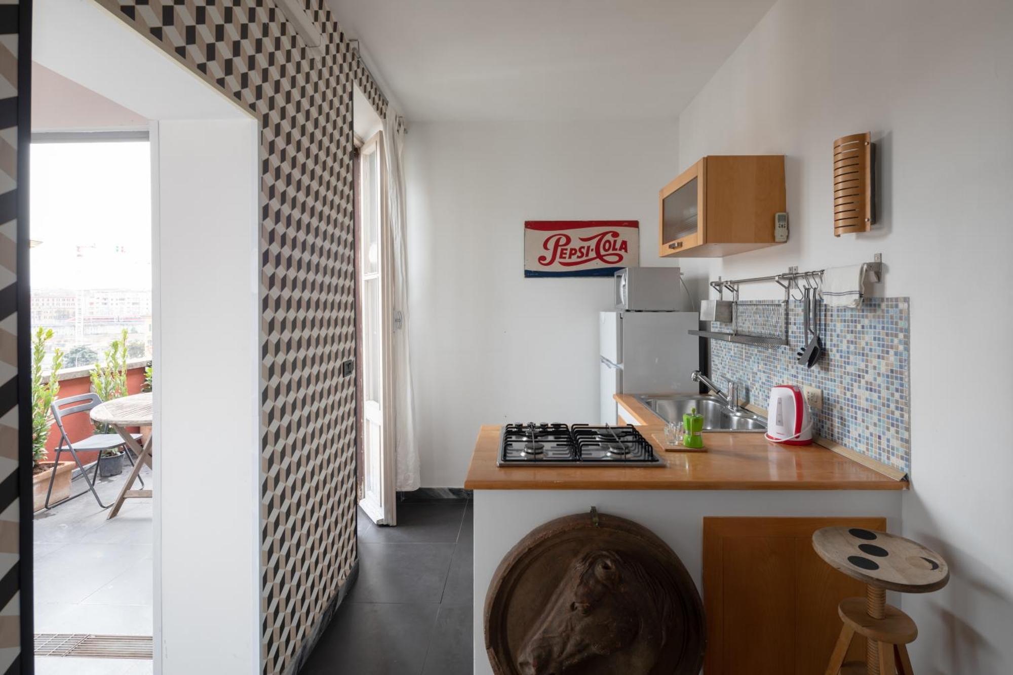 Apartment Attic With Terrace In San Lorenzo Rom